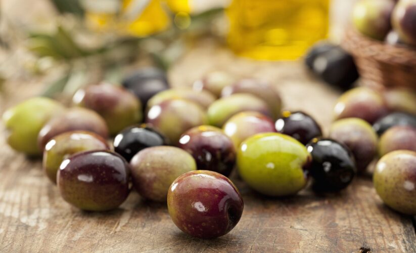 Olives are classified as a fruit, specifically a drupe, and not a vegetable.